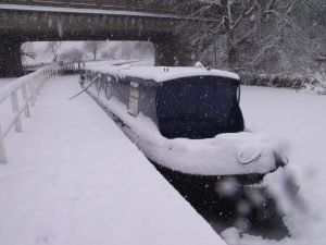 Narrowboat Audrey Too in snow